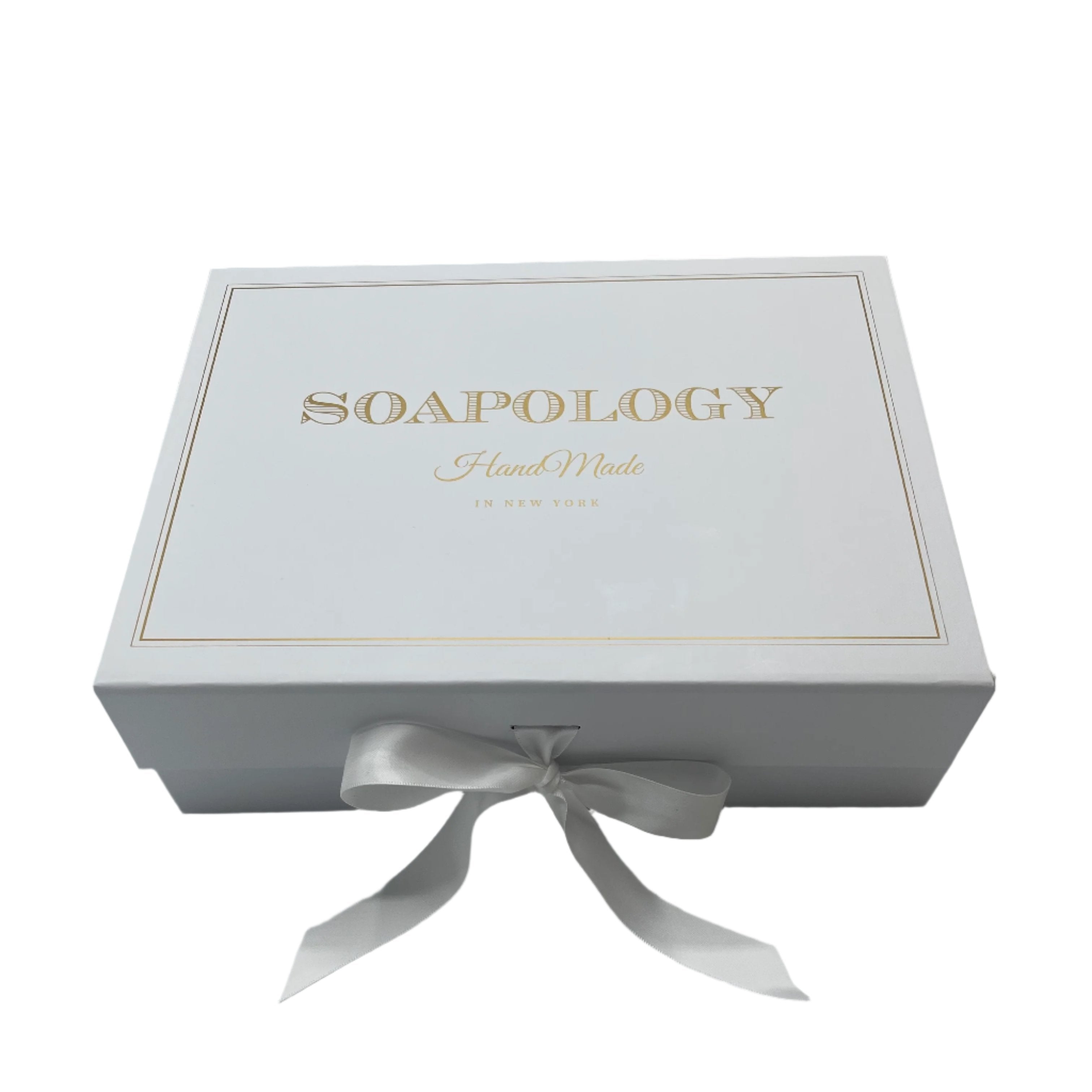 SoapologyNYC Signature Gift Box containing assorted luxurious soaps in elegant packaging designed for gifting.
